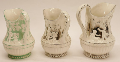 9 Assorted Wedgwood Pitchers