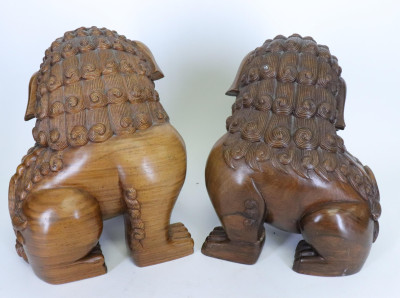 Matching Hardwood Stands with two Carved Foo Dogs