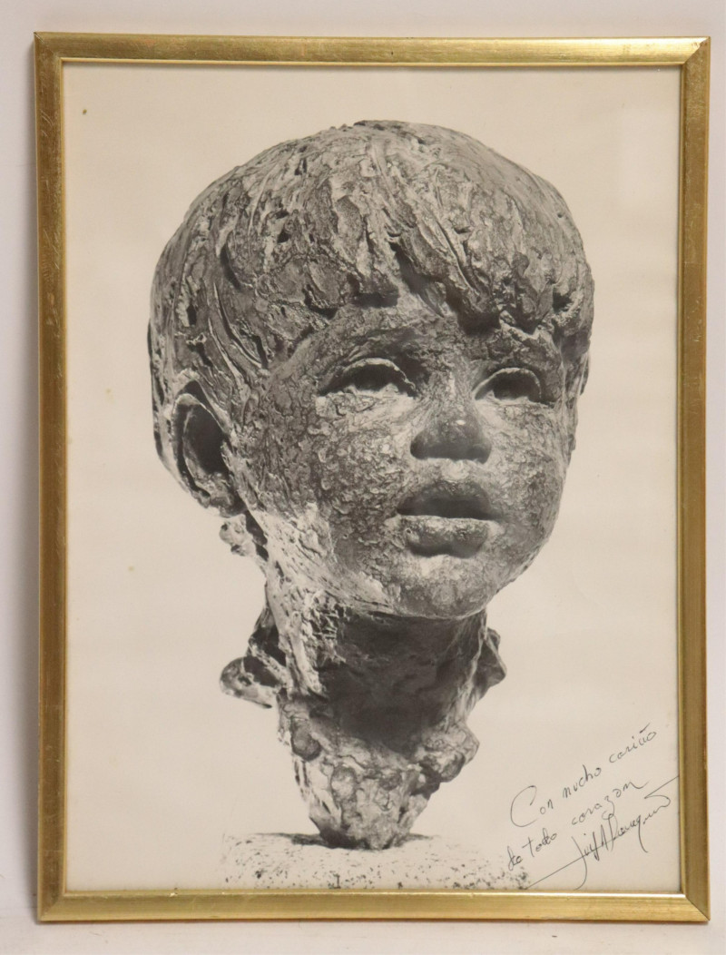 Photo of a Sculpture of a Boy&apos;s Head