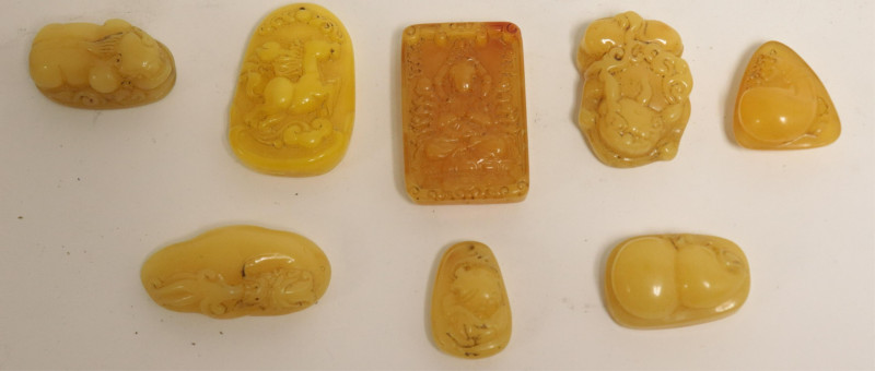 8 Asian Butterscotch Amber Carvings