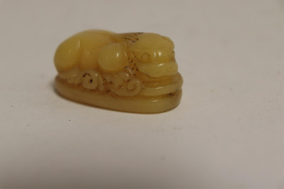 8 Asian Butterscotch Amber Carvings