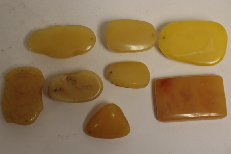8 Asian Butterscotch Amber Carvings